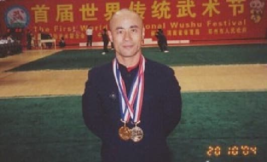 2004 · Double gold, 1st World Traditional Wushu Festival